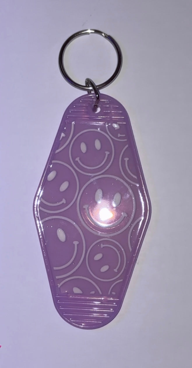 Smiley face keychain purple
