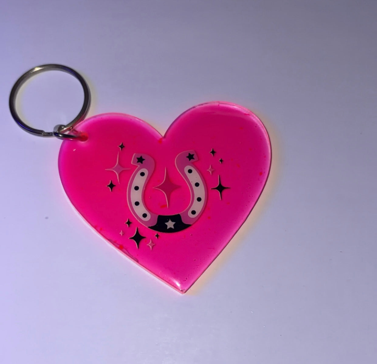 Neon pink horse shoe heart keychain