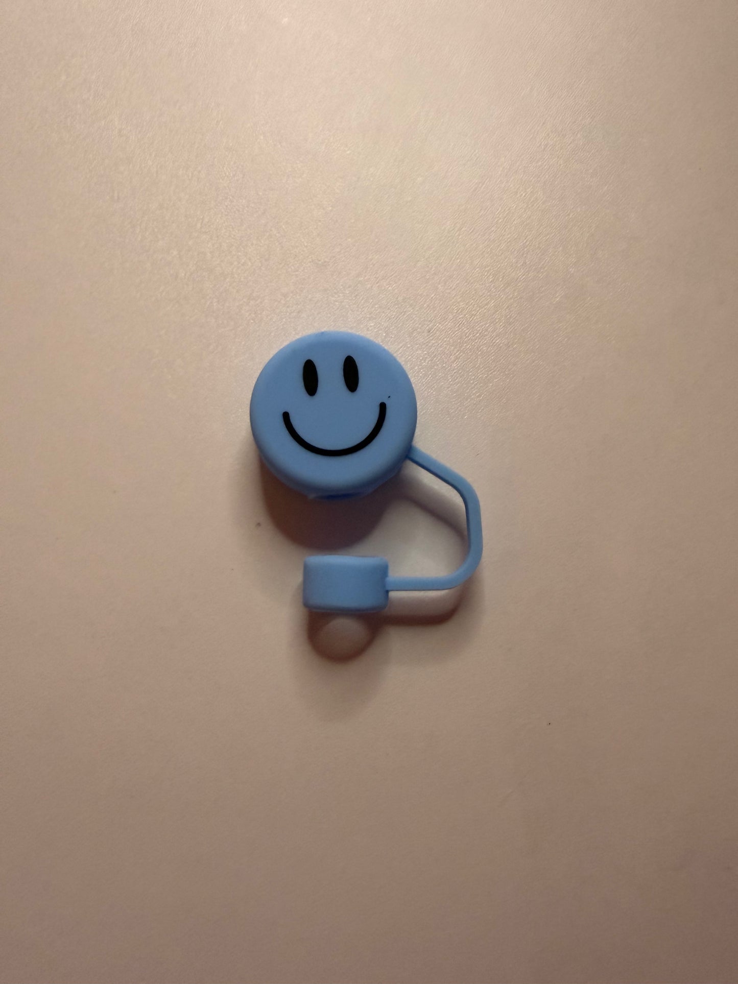 Blue smiley face straw topper