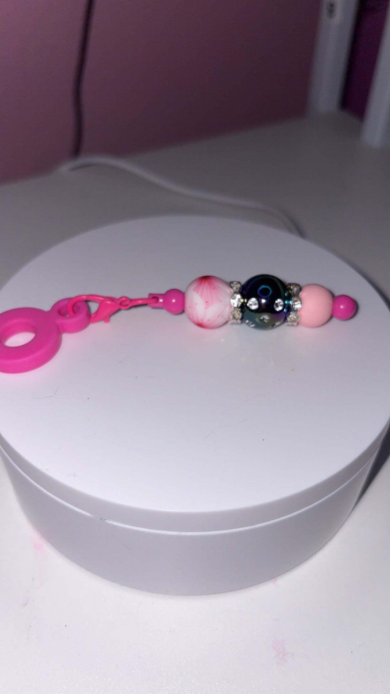 Pink and black straw charm ￼