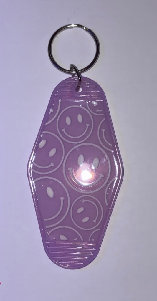 Smiley face keychain purple