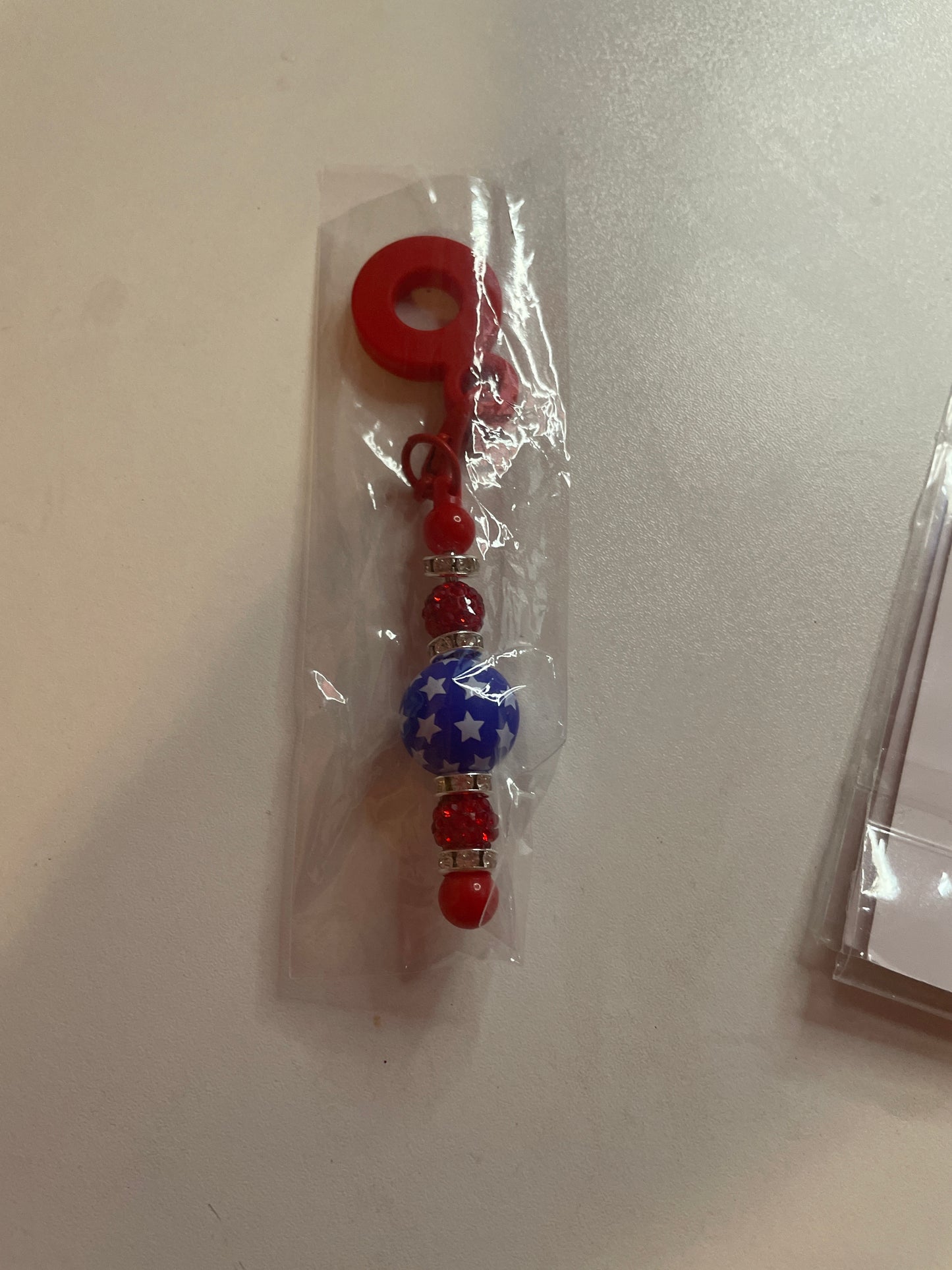 Straw charm red blue