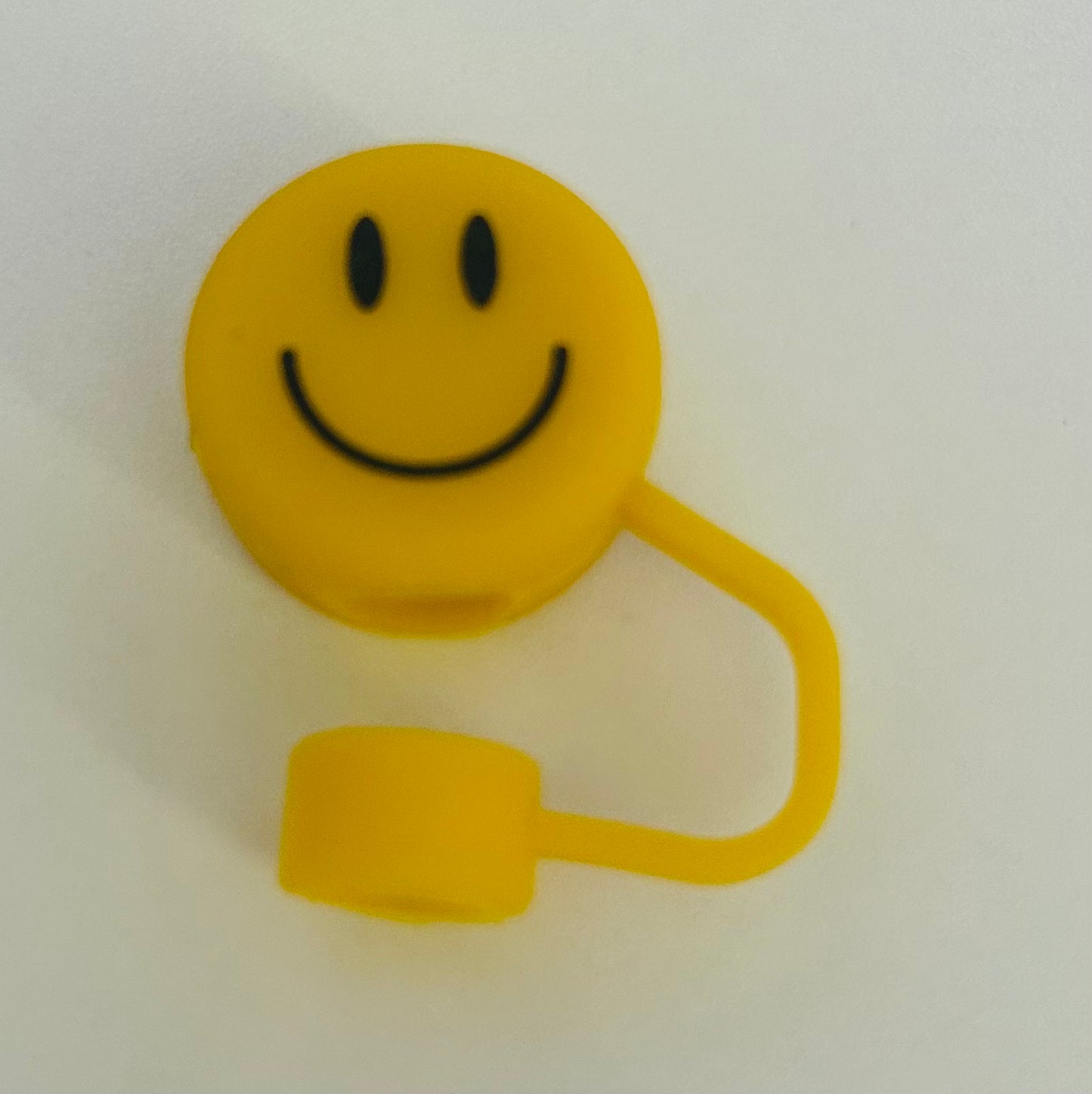 Yellow smiley, face straw topper